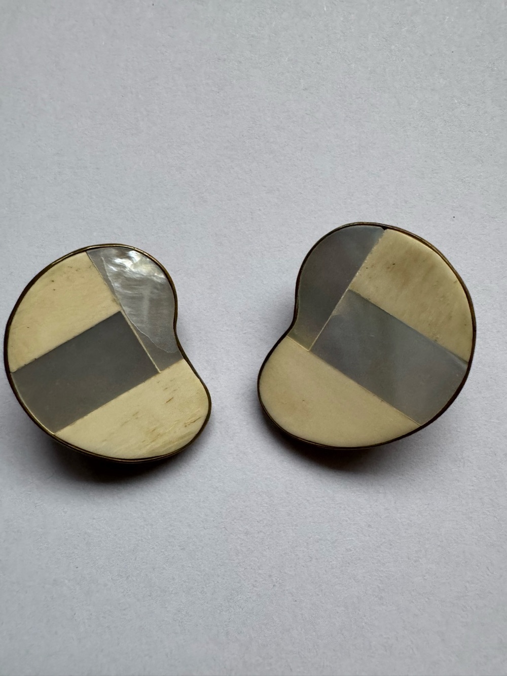 Vintage mother of pearl and ivory clip-on earrings, from Stanley Korshak